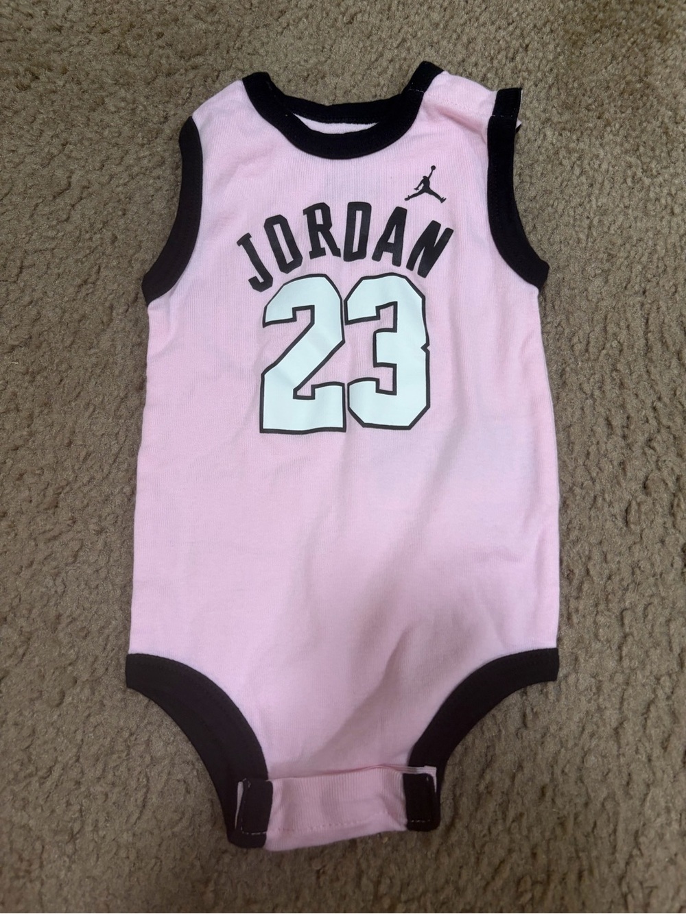 Jordan Pink Baby Onesie with Red Jumpman and Black Trim 12 months